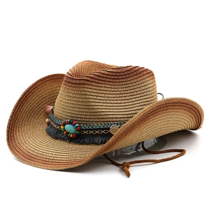 Detail of bohemian straw cowboy hat with turquoise bead band and adjustable chin strap