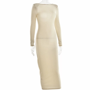 Close-up of beige shimmering fabric and sleek bodycon fit on a long-sleeve dress