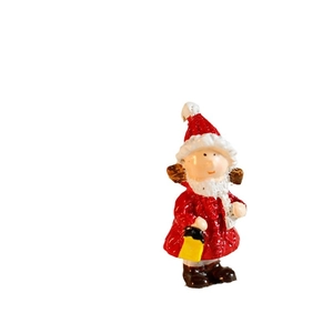 Miniature Christmas Santa Claus figurine with a yellow lantern for holiday decor