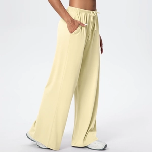 Detail of drawstring high waist and side pockets on brushed wide leg lounge pants