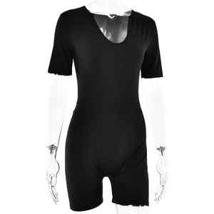 Detailed close-up of a black short-sleeved V-neck bodysuit on a mannequin with smooth fabric