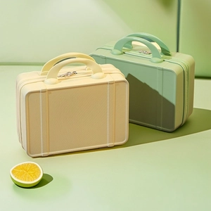 Retro 14-inch mini hardshell suitcase and makeup case in cream and light green tones