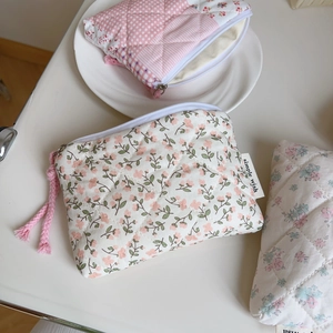Pink floral quilted mini storage bags in three patterns for lipstick and earphones