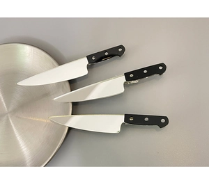 Three creative realistic kitchen knife hairpins in silver and black on metal tray