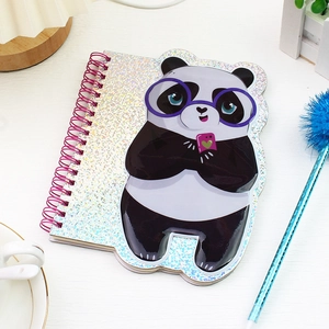 Detail of cute panda spiral notebook with a shiny holographic laser cover design