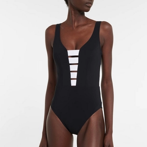 Minimalist V-neck one-piece swimsuit in black with white stripes and ribbed texture