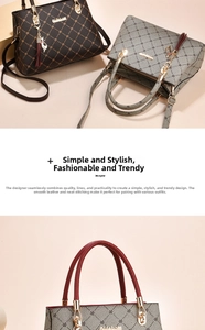 Detail view of large capacity faux leather tote bag with floral pattern and cat pendant