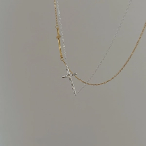 Two-tone 925 sterling silver cross necklace with gold and silver asymmetric pendants