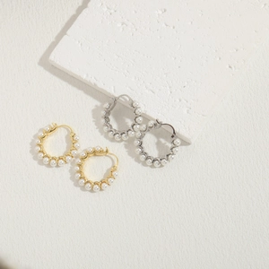 Minimalist pearl beaded hoop earrings in gold and silver plating on stone base