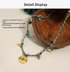 Detail of 18K gold-plated titanium steel necklace with blue woven thread and moon charm
