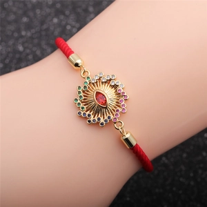 Bracelet œil maléfique en zircon coloré avec cordon rouge et pendentif solaire doré
