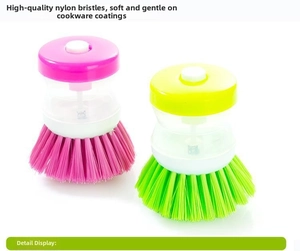Macro shot of nylon bristles and soap dispenser button on the kitchen cleaning brush