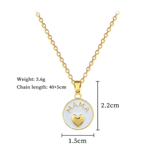 Macro shot showing dimensions and weight of golden MAMA pendant with white enamel