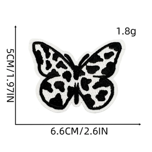 Leopard print butterfly embroidery patch in black and white with 6.6cm x 5cm dimensions