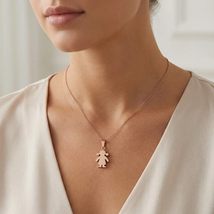 Rose gold little girl pendant necklace on model showing polished steel jewelry detail