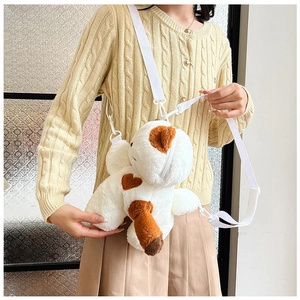 Detailed view of a soft calico cat plush crossbody bag with an adjustable white strap