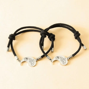 Pair of adjustable handmade braided couple bracelets with stainless steel Yin Yang fish charms