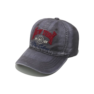 Close-up of the vintage washed grey baseball cap with detailed New York 3D embroidery