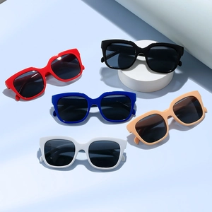 Chic square oversized sunglasses in multiple colors on a blue minimalist background