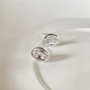 Polished 925 sterling silver pig nose stud earrings with a minimalist mirror finish