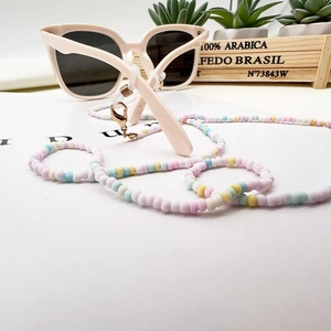 Detail of colorful acrylic beaded eyeglass chain with lobster clasps and silicone loops