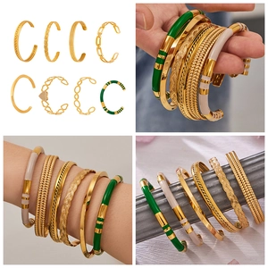 Detail of 8pcs set PVD gold plated open bracelets with chain and enamel texture