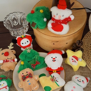Plush Christmas tree ornaments and festive stuffed charms set in vibrant holiday colors
