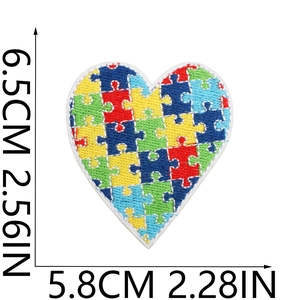 Detailed view of heart-shaped autism puzzle patch with precise 6.5x5.8cm dimensions