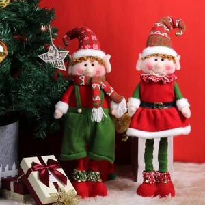 Paire de poupées elfes de Noël debout avec jambes extensibles en couleurs rouge et vert
