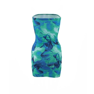 Detail of the blue and green abstract floral print on a strapless bodycon dress