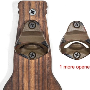 Detail of wall-mounted beer opener set with wood base and extra metal opener tool