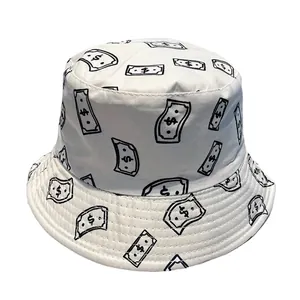 Reversible canvas bucket hat with black dollar bill graffiti print on white background