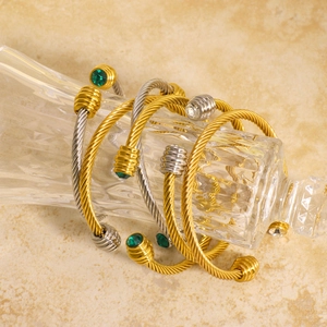 Two-tone stainless steel cable wire bracelet set with green and clear crystals