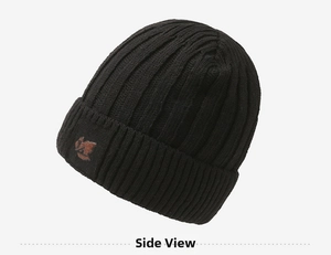 Close-up of black ribbed knit beanie featuring a brown fox head embroidery detail