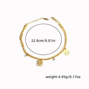 Detail showing titanium steel double-layer clover bracelet with rhinestones and size data