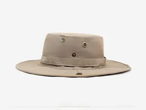 Detail of khaki wide brim fishing hat with metal eyelets and reinforced stitching