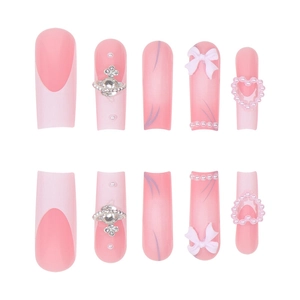 Pink press on nails set with gradient design, 3D bows, pearls and planet charms