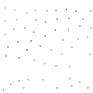 Detail of grey polka dot wall stickers on a white background for DIY nursery decoration