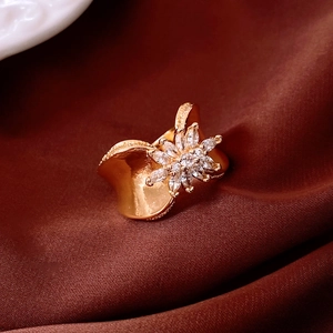 Detailed macro view of 18K gold plated ring featuring a sparkling zircon flower design