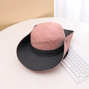 Pink and gray wide brim sun hat detail featuring breathable mesh and quick-dry fabric