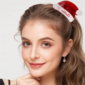 Detail of red and white Christmas hat hair claw with snowflake pattern worn on hair