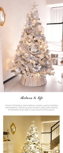 Detailed view of silver and white Christmas tree with snow effect, bows, and LED lights