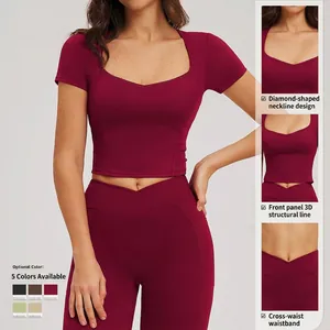 Women's burgundy yoga set with diamond neckline top and criss-cross waist leggings