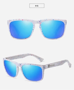 Detail of white splash-painted frames and blue mirrored lenses on sport sunglasses