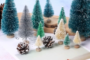 Close-up of mini sisal bottle brush trees with snow effect and solid wood bases