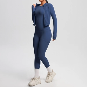 Detailed side view of high-stretch navy blue 3-piece yoga set with zippered jacket and leggings