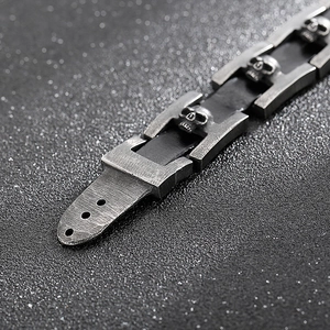 Bracciale teschio in acciaio inossidabile retrò con cinturino in pelle intrecciata