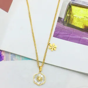 Golden titanium steel necklace with white mother-of-pearl flower pendants and crystals