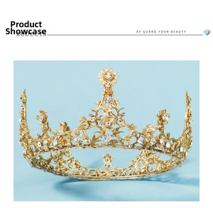 Detailed view of luxury gold bridal crown with floral crystal and rhinestone patterns