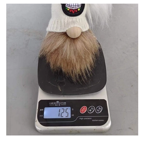 Detail showing plush Halloween gnome weight of 125g with white knitted hat and beard
